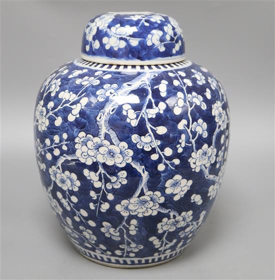 A large Chinese blue and white jar and cover, Kangxi mark, late 19th century, height 30cm